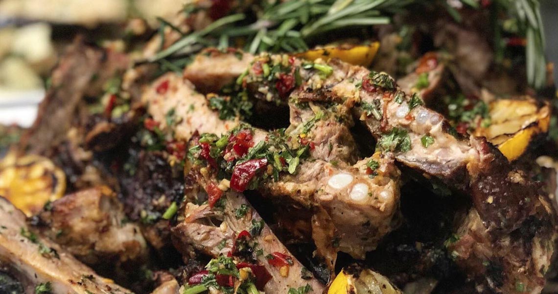 Ribs and rosemary on a plate