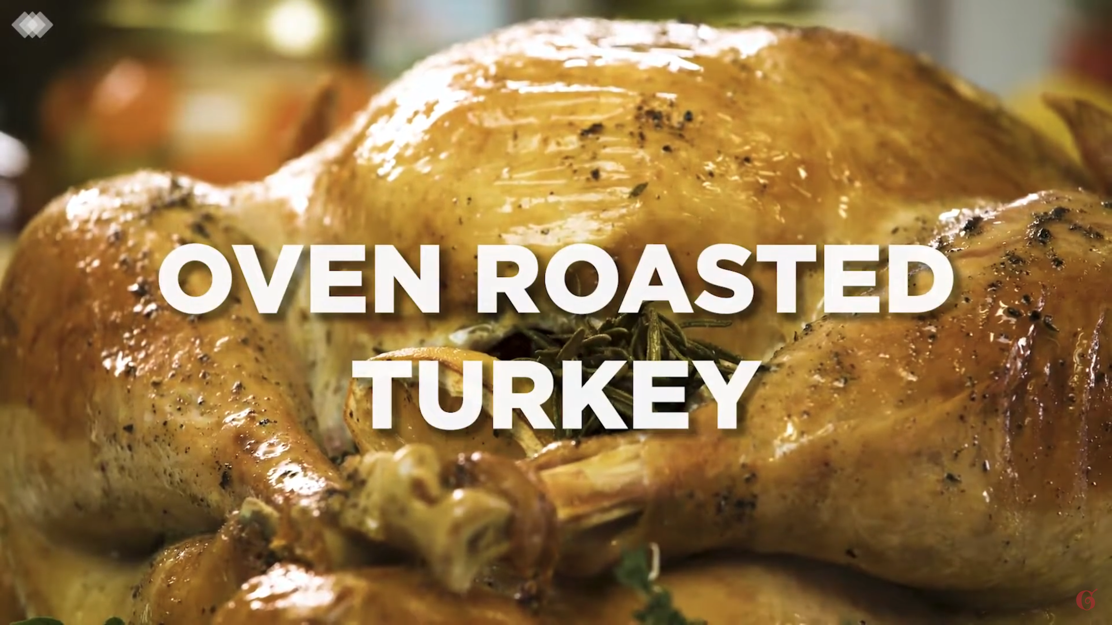 Freshly roasted turkey facing the camera with "oven roasted turkey" in text over it