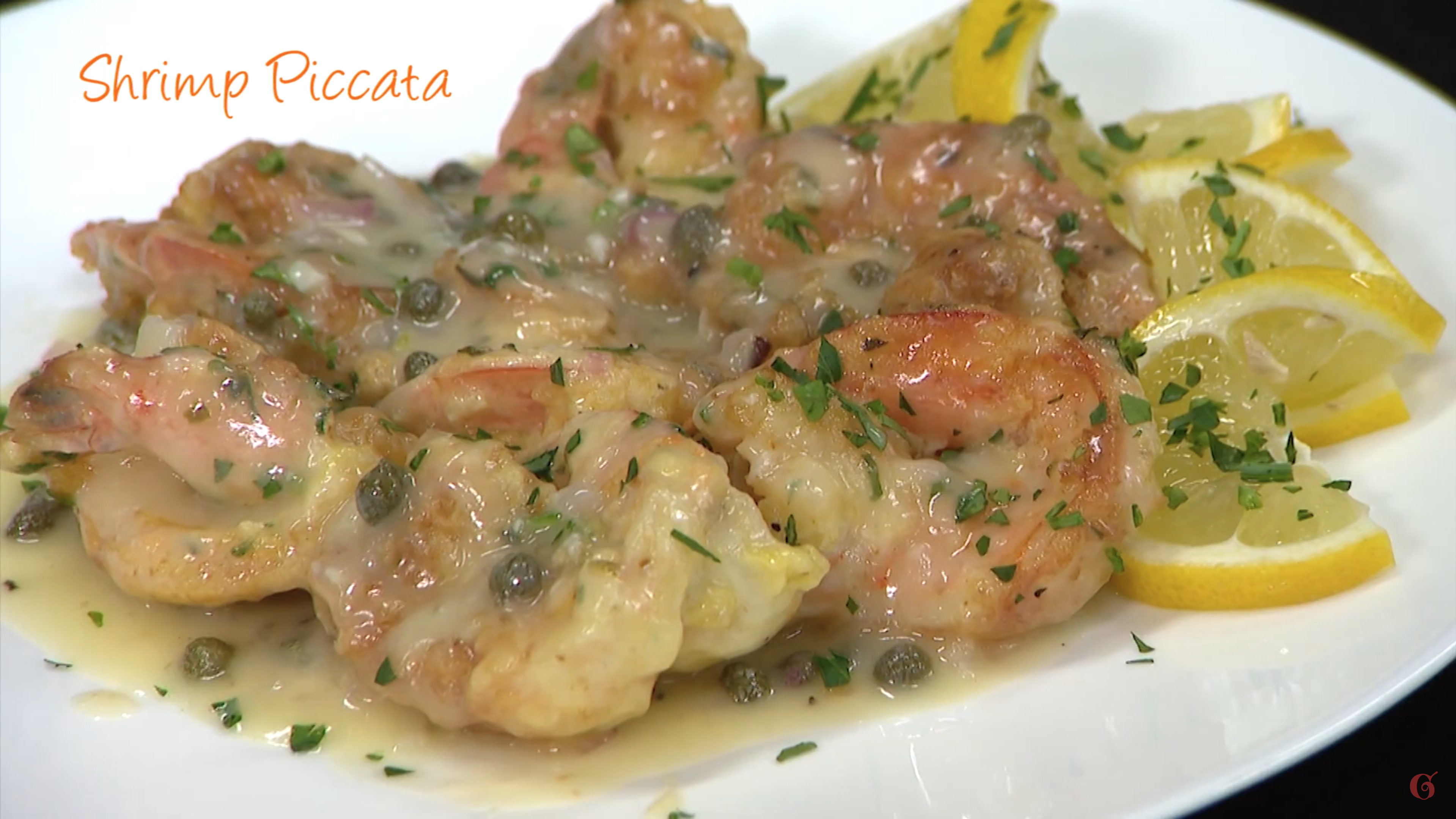 Shrimp piccata on a white plate